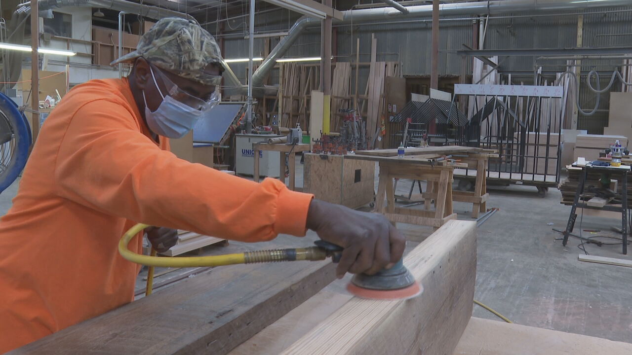 Man sanding